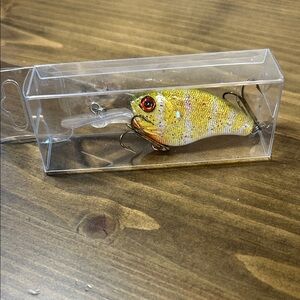Yellow Fishing Lure with Red Accents